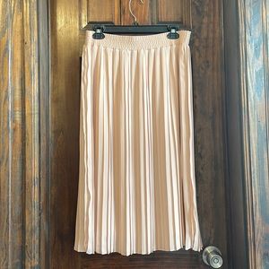 Pale pink pleated midi skirt